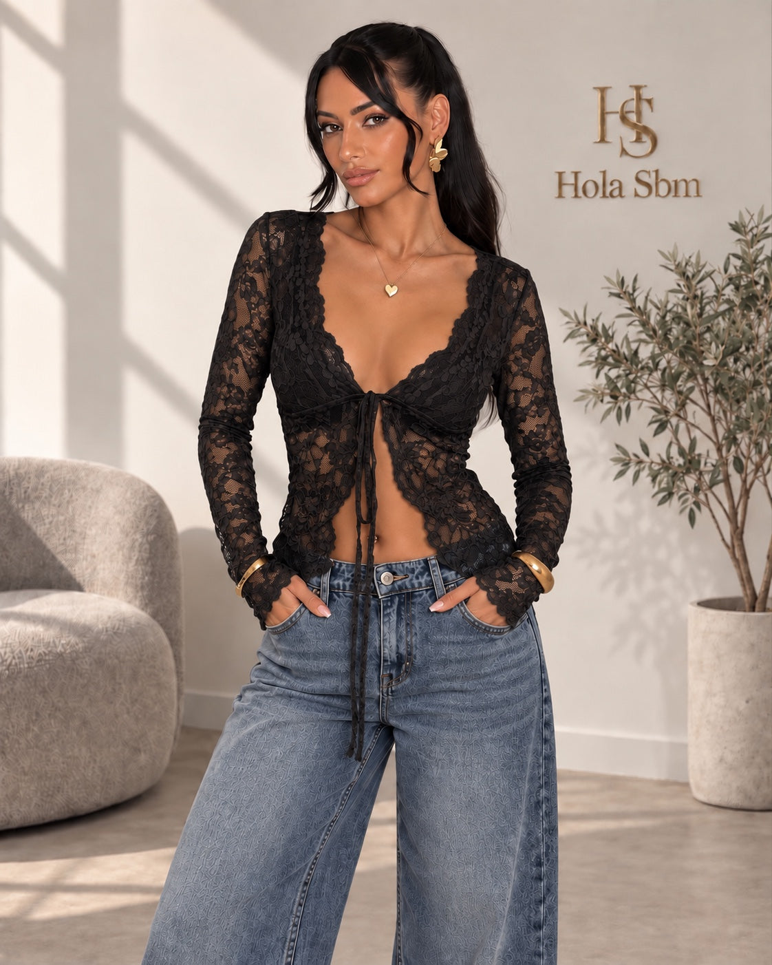 Top Sicret nero in pizzo floreale a maniche lunghe con laccetto frontale