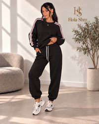 Coordset Kalyro nero con righe rosa indossato
