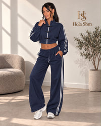 Coordset Kaoryn Blu navy - felpa cropped con zip e pantalone ampio
