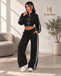 Coordset Kaoryn Nero - felpa cropped con zip e pantalone ampio