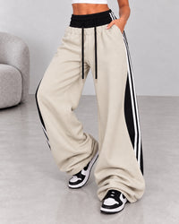 Pantalone Zhara champagne con contrasti neri