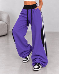 Pantalone Zhara viola con contrasti neri