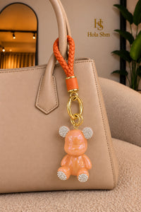 Portachiavi Charm Teddy arancione con orsetto iridescente