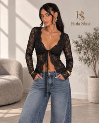 Top Sicret nero in pizzo floreale a maniche lunghe con laccetto frontale